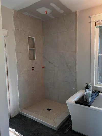 Custom Corner Shower w/ Niche Detail 1