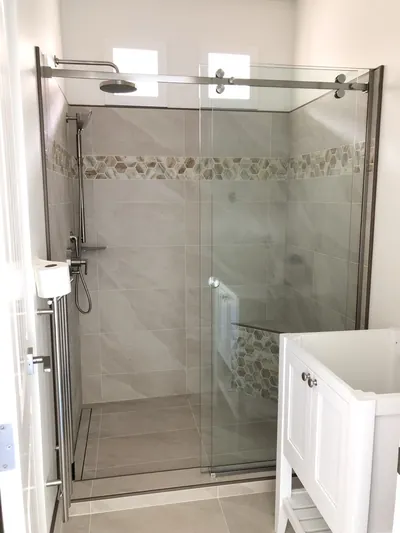 Custom Shower w/ Linear Drain, Corner Bench, and Feature Band Details 5
