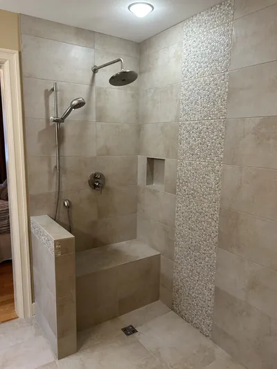 Custom Tile Shower w/ Bench, Pony Wall, Niche, and Feature Band Details 1